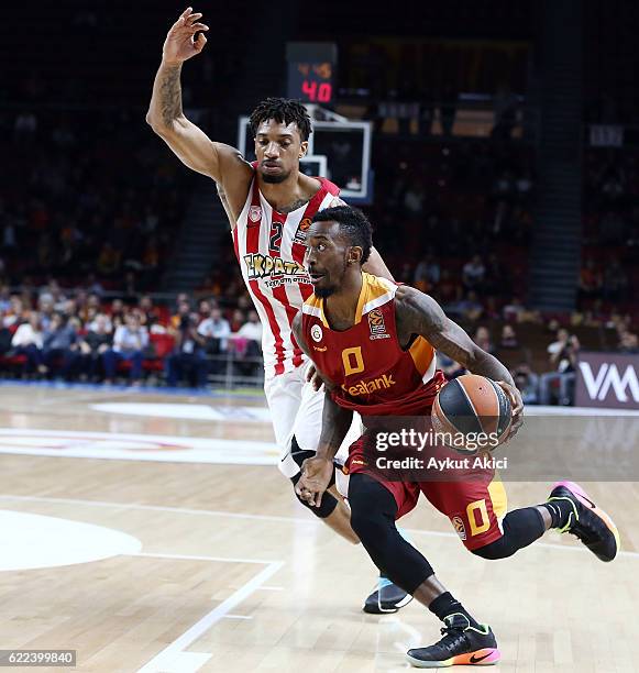 Russ Smith, #0 of Galatasaray Odeabank Istanbul competes with Khem Birch, #2 of Olympiacos Piraeus during the 2016/2017 Turkish Airlines EuroLeague...