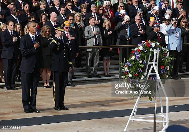 President Barack Obama participates in a wreath-laying ceremony at the Tomb of the Unknown Soldier at Arlington National Cemetery on Veterans Day...