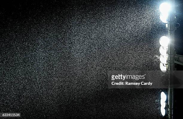 Northern Ireland , Ireland - 11 November 2016; A detailed view of rain falling over the floodlights ahead of the FIFA World Cup Group C Qualifier...
