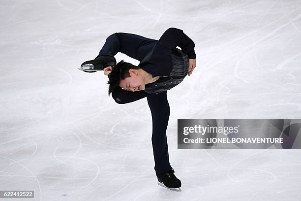Kazakhstan's Denis Ten performs during the Men short program at the ISU Grand Prix of Figure Skating in Paris on November 11, 2016. / AFP / LIONEL...