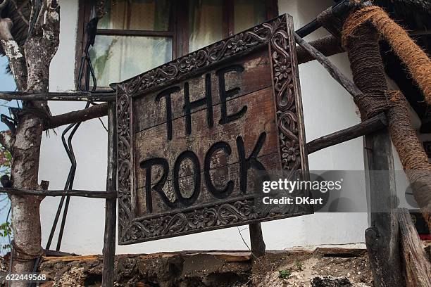 the rock restaurant in zanzibar logo - hut logo stock pictures, royalty-free photos & images