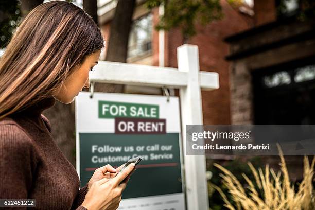 house for sale in the city downtown - toronto sign stock pictures, royalty-free photos & images