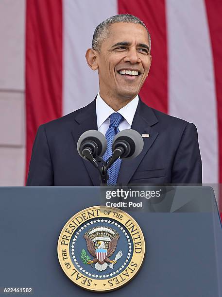 President Barack Obama makes remarks in the Memorial Amphitheater on Veterans Day after laying a wreath at the Tomb of the Unknown Soldier at...