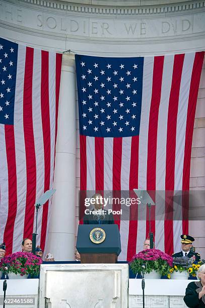 President Barack Obama makes remarks in the Memorial Amphitheater on Veterans Day after laying a wreath at the Tomb of the Unknown Soldier at...