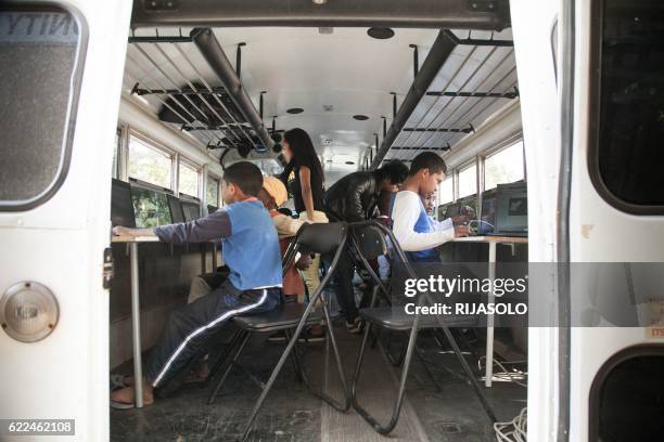 Malagasy children aged 7 to 13 learn how to code on the CODER bus on September 24, 2016 in Antananarivo. - This project was created in October 2015...