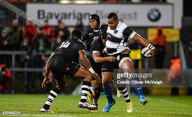 Northern Ireland , Ireland - 11 November 2016; Taqele Naiyaravoro of Barbarians is tackled by Akapusi Qera of Fiji during the Representative Fixture...