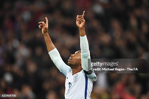 Daniel Sturridge of England celebrates scoring the opening goal during the FIFA 2018 World Cup Qualifier between England and Scotland at Wembley...