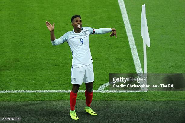 Daniel Sturridge of England celebrates scoring the opening goal during the FIFA 2018 World Cup Qualifier between England and Scotland at Wembley...