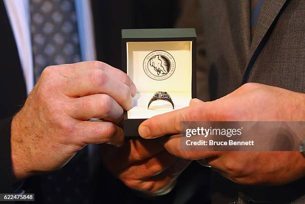 Eric Lindros is presented his Hall of Fame ring during a Hall of Fame Induction photo opportunity at the Hockey Hall Of Fame on November 11, 2016 in...