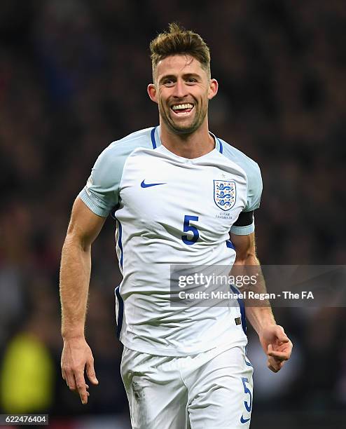 Gary Cahill of England celebrates scoring his team's third goal during the FIFA 2018 World Cup Qualifier between England and Scotland at Wembley...