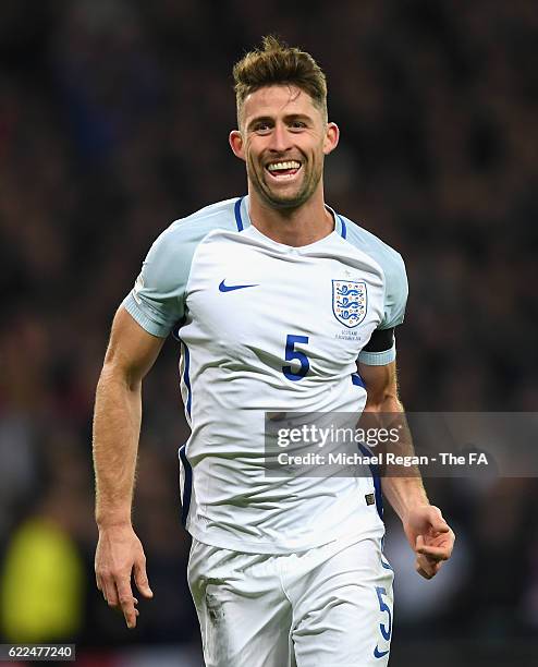 Gary Cahill of England celebrates scoring his team's third goal during the FIFA 2018 World Cup Qualifier between England and Scotland at Wembley...