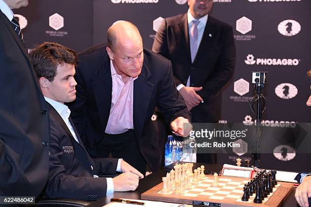 The first move for Reigning Chess Champion Magnus Carlsen against Chess grandmaster Sergey Karjakin is made by Actor Woody Harrelson during 2016...