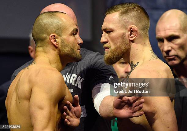 Lightweight champion Eddie Alvarez and Conor McGregor of Ireland face off during the UFC 205 weigh-in inside Madison Square Garden on November 11,...