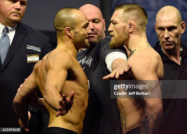 Lightweight champion Eddie Alvarez and Conor McGregor of Ireland face off during the UFC 205 weigh-in inside Madison Square Garden on November 11,...