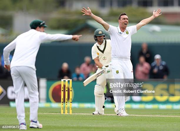 Kyle Abbott of South Africa appeals for the wicket of Joe Burns of Australia during day one of the Second Test match between Australia and South...