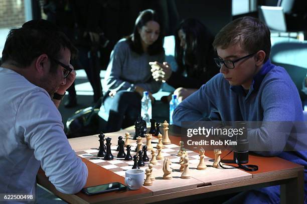 Guests attend 2016 World Chess Championship at Fulton Market Building on November 11, 2016 in New York City.