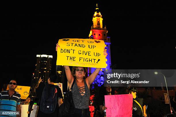 Protester marches at the anti-Trump protest in downtown Miami on November 11, 2016 in Miami, Florida.