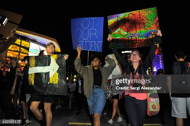 Protesters march during anti-Trump protest in downtown Miami on November 11, 2016 in Miami, Florida.