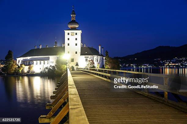 castle place at night - gmunden austria stock pictures, royalty-free photos & images