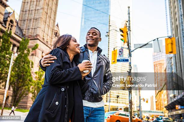 out for shopping in downtown - daily life in toronto stock pictures, royalty-free photos & images