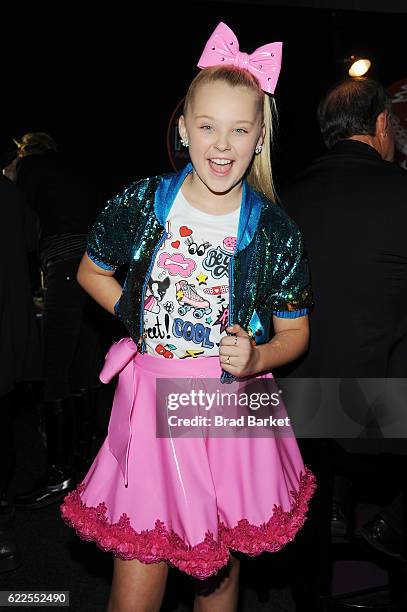 JoJo Siwa poses backstage during the 2016 Nickelodeon HALO awards at Basketball City - Pier 36 - South Street on November 11, 2016 in New York City.