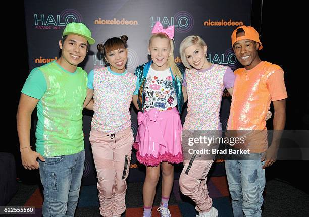 JoJo Siwa poses backstage with dancers during the 2016 Nickelodeon HALO awards at Basketball City - Pier 36 - South Street on November 11, 2016 in...