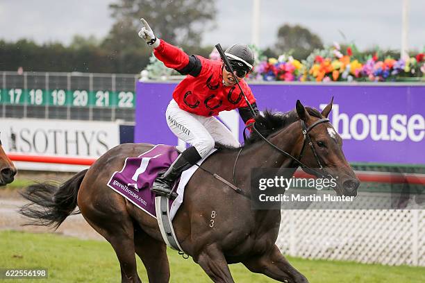 Jockey Racha Cuneen riding no 1 La Diosa celebrates winning race 7 44th NZ 1000 Guineas during New Zealand Cup Day at Riccarton Park Racecourse on...