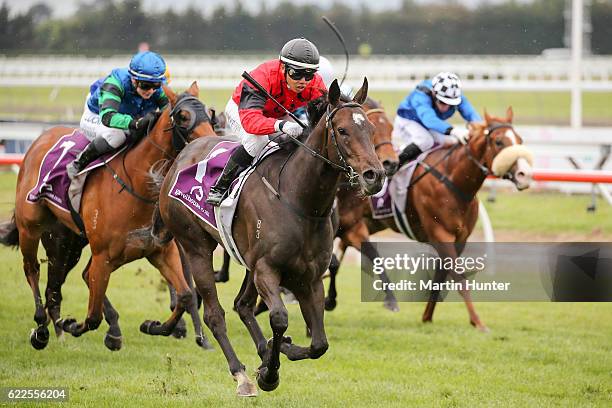 Jockey Racha Cuneen riding no 1 La Diosa celebrates winning race 7 44th NZ 1000 Guineas during New Zealand Cup Day at Riccarton Park Racecourse on...