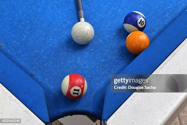 game balls on a outdoor billiards table - snooker and pool stock pictures, royalty-free photos & images