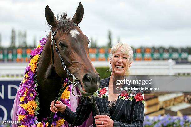 Trainer Mandy Brown poses with La Diosa after winning race 7 44th NZ 1000 Guineas during New Zealand Cup Day at Riccarton Park Racecourse on November...