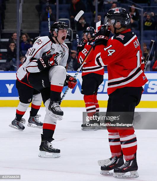 Antoine Waked of the Rouyn-Noranda Huskies celebrates his teammate game tying goal late in the third period against the Quebec Remparts during their...