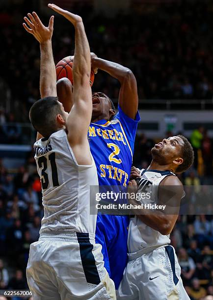 James Harvey of the McNeese State Cowboys shoots the ball against Dakota Mathias of the Purdue Boilermakers at Mackey Arena on November 11, 2016 in...