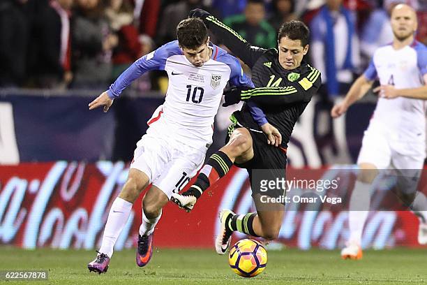 Javier Hernandez of Mexico fights for the ball with Christian Pulisic of USA during the match between USA and Mexico as part of FIFA 2018 World Cup...