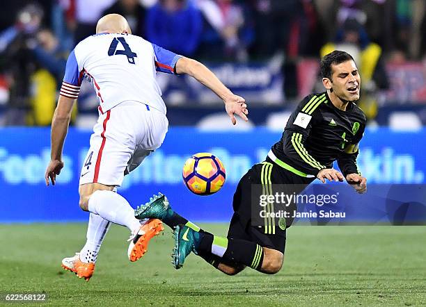 Michael Bradley of the United States battles for the ball against Rafael Marquez of Mexico in the second half during the FIFA 2018 World Cup...