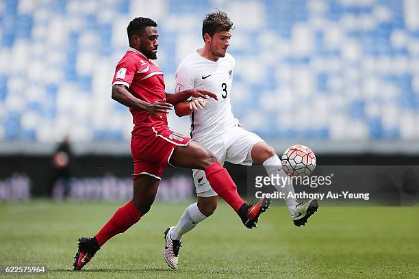 Deklan Wynne competes against Cesar Zeoula of New Caledonia during the 2018 FIFA World Cup Qualifier match between the New Zealand All Whites and New...