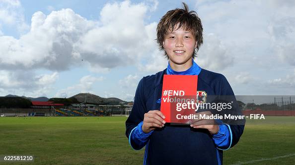 Ruka Norimatsu of Japan stands with a card supporting the... News Photo