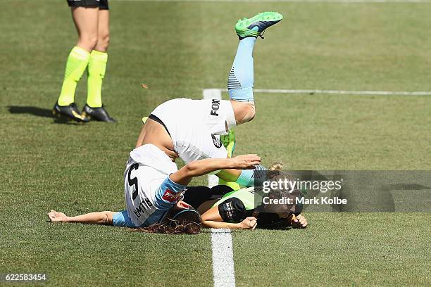 Laura Alleway of Melbourne United falls akwardly after scoring a goal during the round two W-League match between Canberra United and Melbourne City...