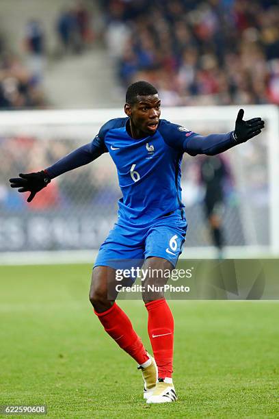 Paul Pogba of France reacts during the 2018 World Cup group A qualifying football match between France and Sweden at the Stade de France in...