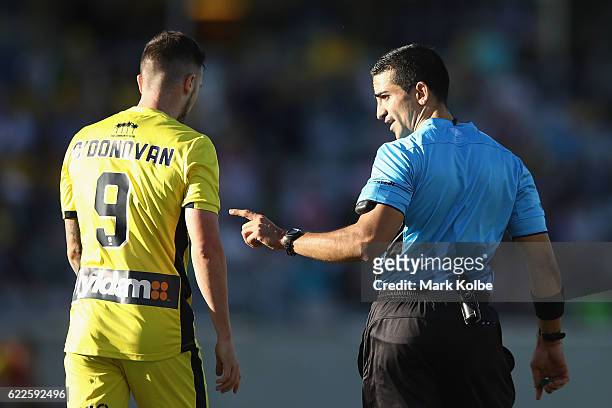 Roy O'Donovan of the Phoenix is spoken to by referee Stephen Lucas during the round six A-League match between the Central Coast Mariners and the...