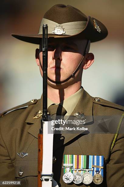 Member of the Australia Defence Force is seen in the Remembrance Round pre-match ceremony during the round six A-League match between the Central...