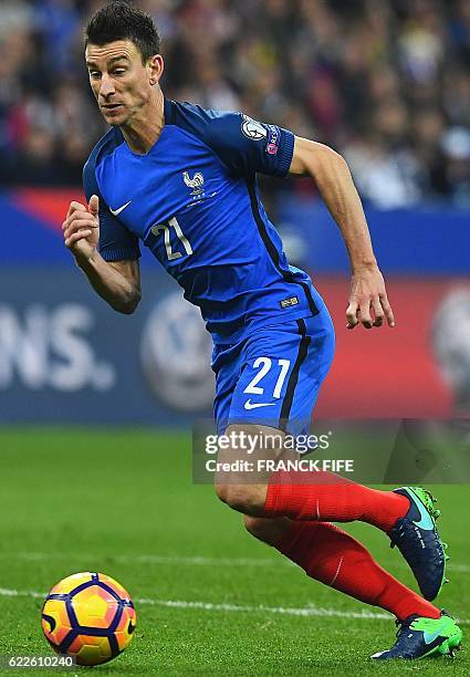 France's defender Laurent Koscielny controls the ball during the 2018 World Cup group A qualifying football match between France and Sweden at the...