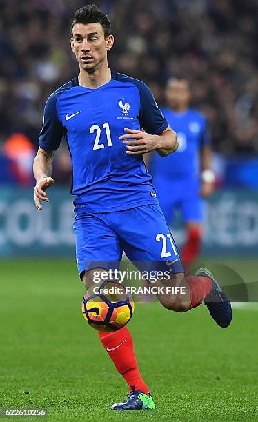 France's defender Laurent Koscielny controls the ball during the 2018 World Cup group A qualifying football match between France and Sweden at the...