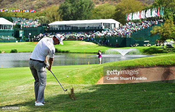 Chris Wood of England plays a shot during the third round of The Nedbank Golf Challenge at Gary Player CC on November 12, 2016 in Sun City, South...