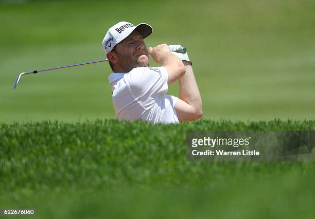 Branden Grace of South Africa plays his second shot on the 10th hole during the third round of the Nedbank Golf Challenge at the Gary Player CC on...