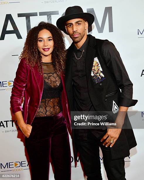 Bertille Sefolosha and Thabo Sefolosha attend the ATTOM Atlanta Store Private Opening on November 11, 2016 in Atlanta, Georgia.