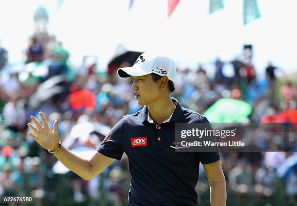 Jeunghun Wang of Korea celebrates a birdie on the 18th green during the third round of the Nedbank Golf Challenge at the Gary Player CC on November...