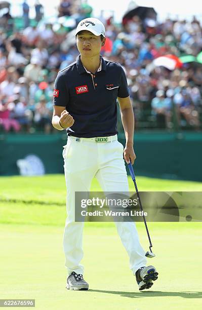 Jeunghun Wang of Korea celebrates a birdie on the 18th green during the third round of the Nedbank Golf Challenge at the Gary Player CC on November...