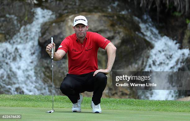 Bradley Dredge of Wales lines up a putt on the ninth green during the third round of the Nedbank Golf Challenge at the Gary Player CC on November 12,...