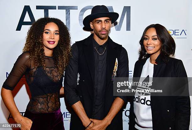 Bertille Sefolosha, Thabo Sefolosha and Keri Hilson attend the ATTOM Atlanta Store Private Opening on November 11, 2016 in Atlanta, Georgia.