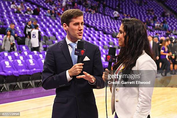 Broadcasters, Julianne Viani and Jonathan Yardley, work on court before the San Antonio Spurs game against the Sacramento Kings on October 27, 2016...